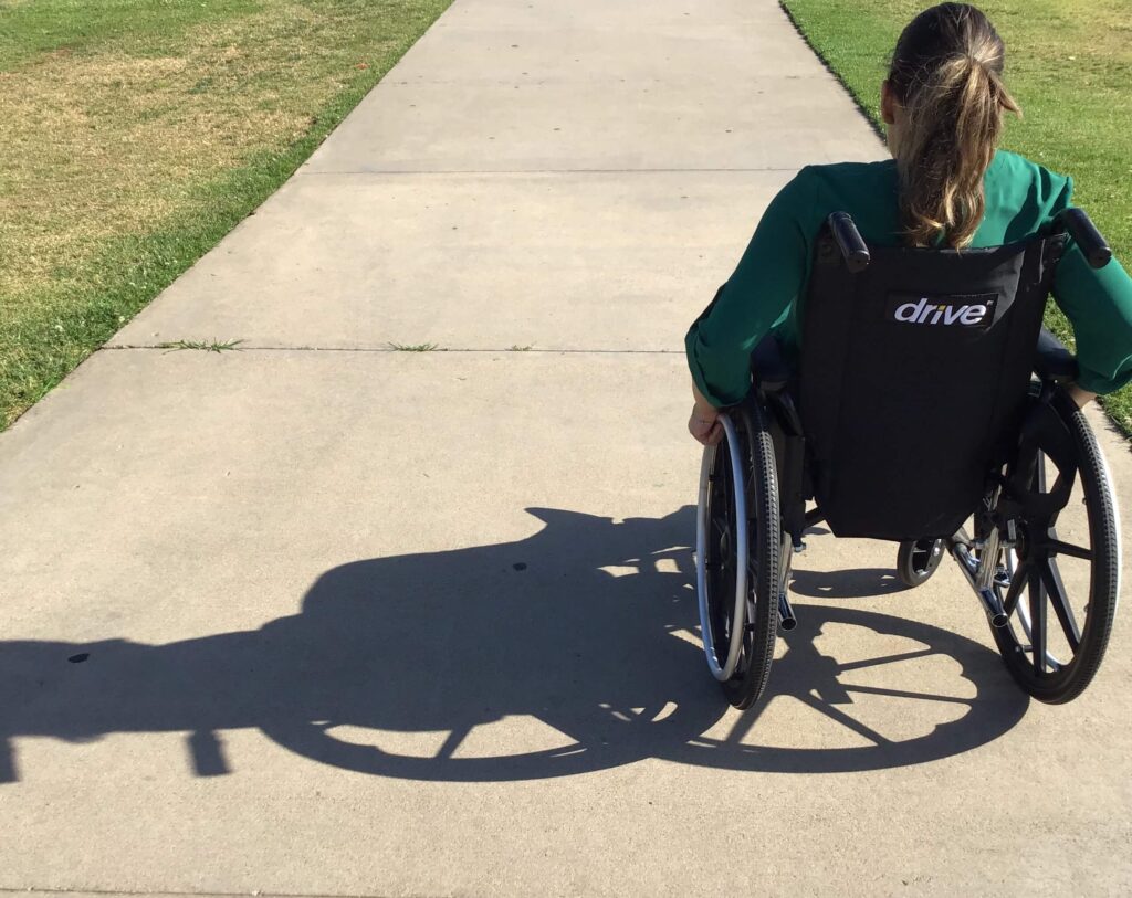 An image of a wheelchair user to represent inclusive architectural design.