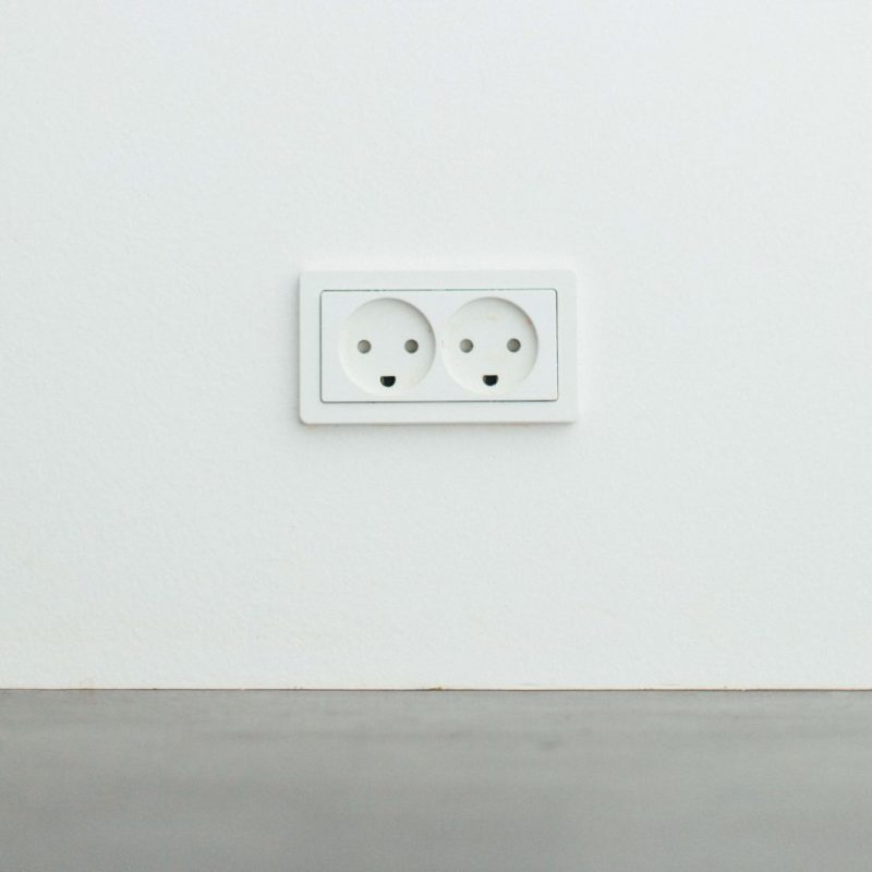 A plug socket to represent electrical building surveying.