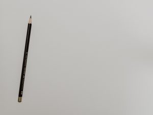 A pencil on paper to represent architecture and design.