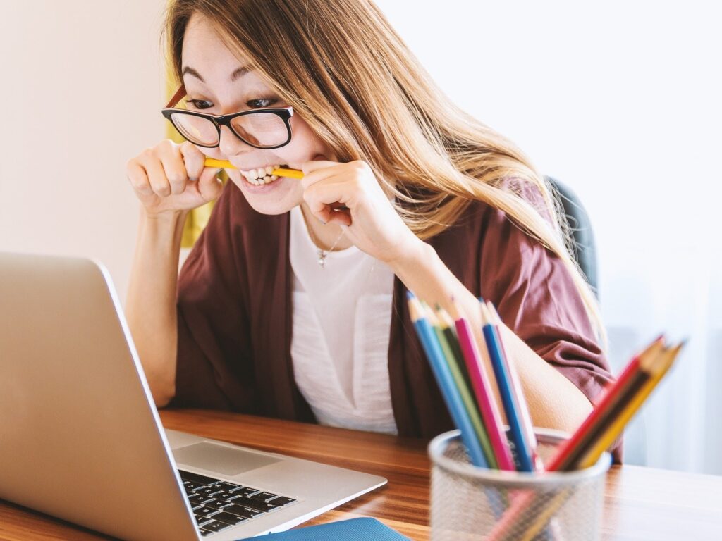 A picture of a stressed woman to mark how our project management team manage their own workplace stress.